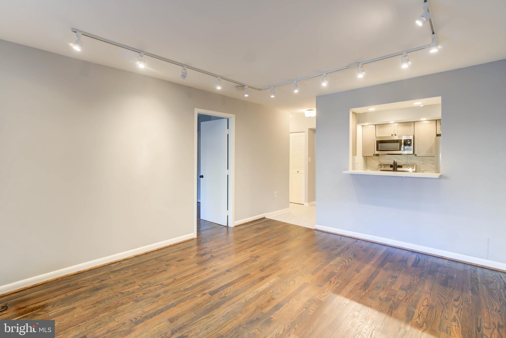 2111 Wisconsin Avenue Northwest, Unit 302 Washington, DC 20007 - Photo 8 of 23 a view of an empty room