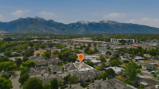 6969 South 855 East Midvale, UT 84047 - Photo 43 of 55 Aerial perspective showcasing a residential area with varied rooflines and surrounding greenery
