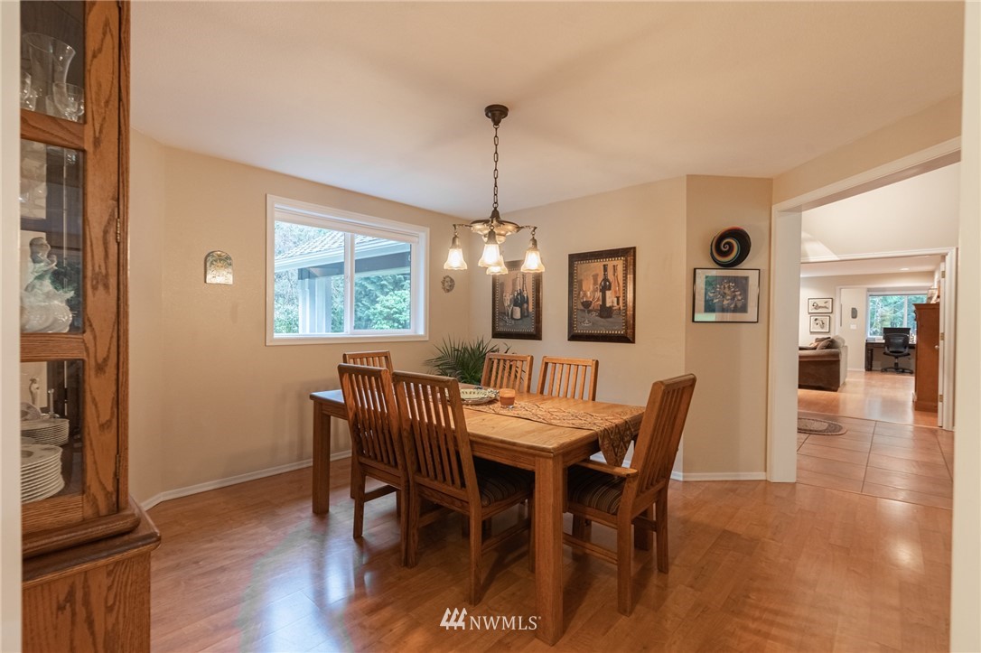 5524 Knight Road Bellingham, WA 98226 - Photo 14 of 34 a view of a dining room with furniture window and wooden floor