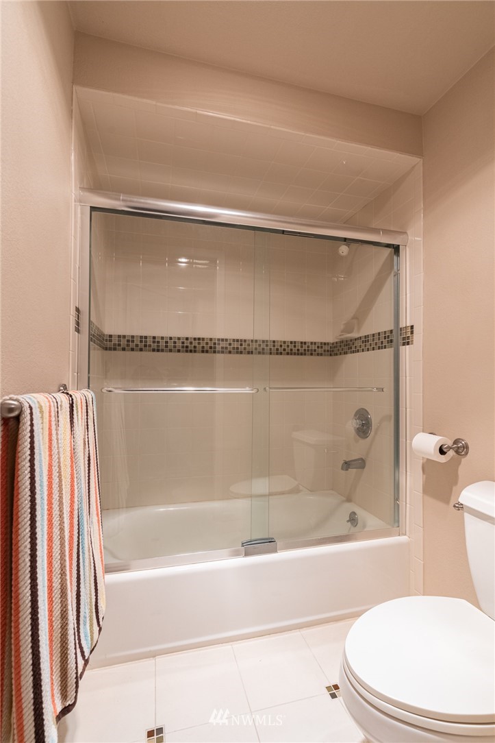 5524 Knight Road Bellingham, WA 98226 - Photo 21 of 34 a bathroom with a bath tub and a shower