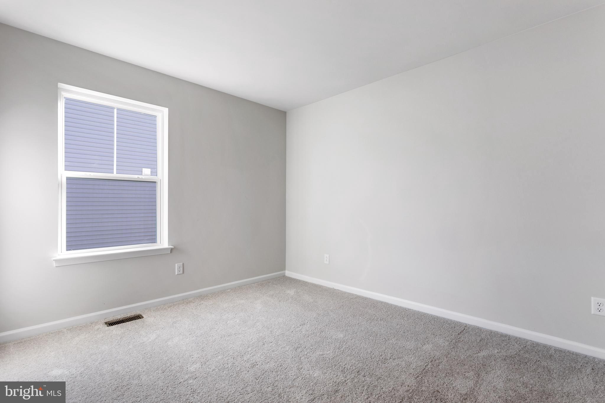 Tbb Pheasant Ridge Road, Unit CRANBERRY Hanover, PA 17331 - Photo 11 of 28 an empty room with windows