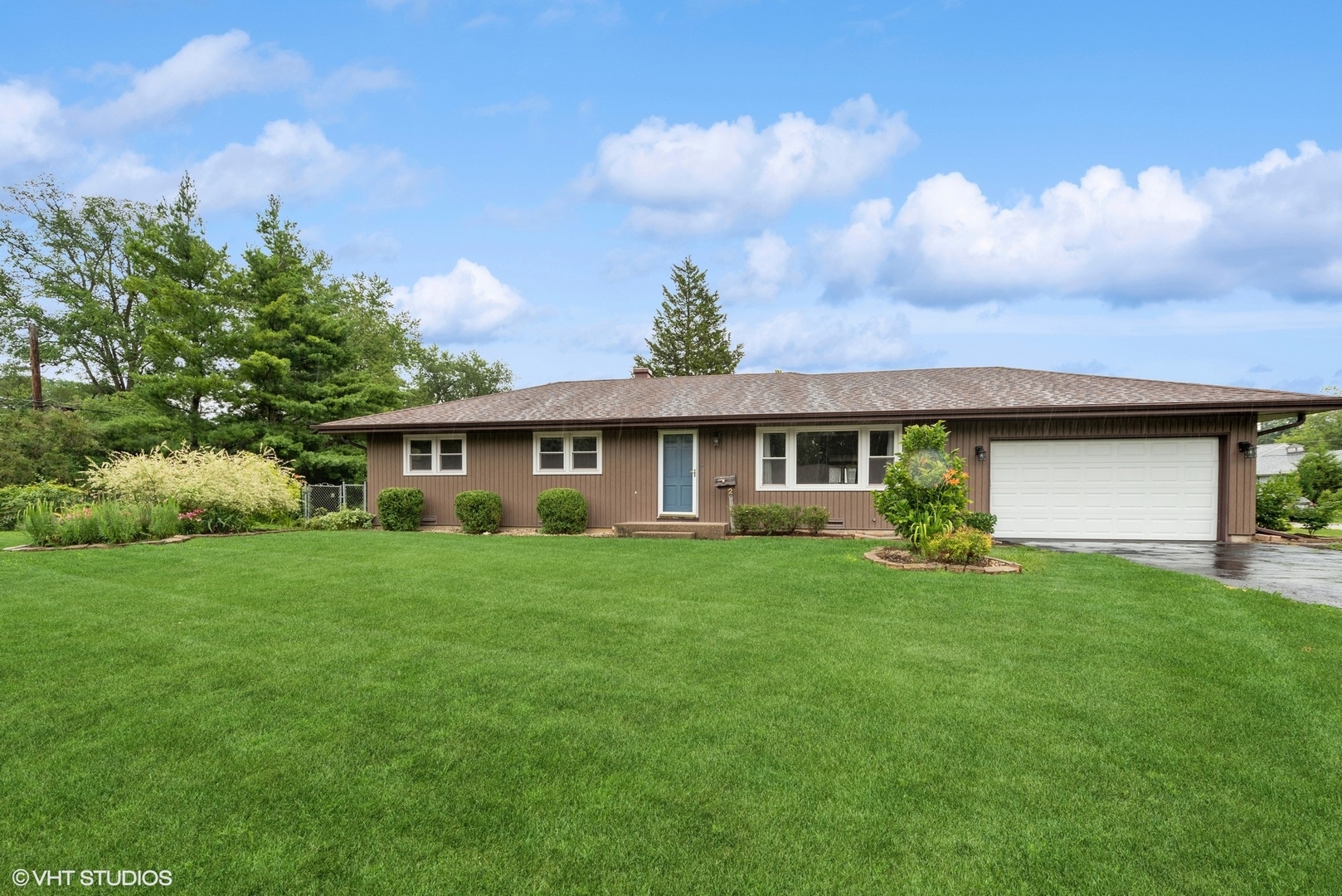 2 Northcrest Road Lake Zurich, IL 60047 - Photo 1 of 30 a front view of a house with a garden