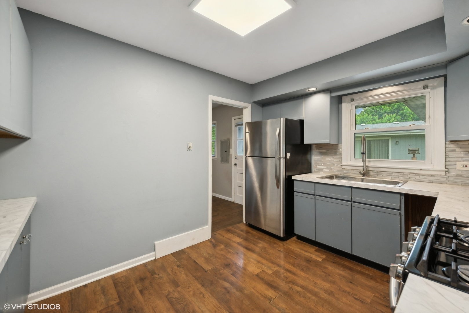 2 Northcrest Road Lake Zurich, IL 60047 - Photo 14 of 30 a kitchen with stainless steel appliances a refrigerator and a sink