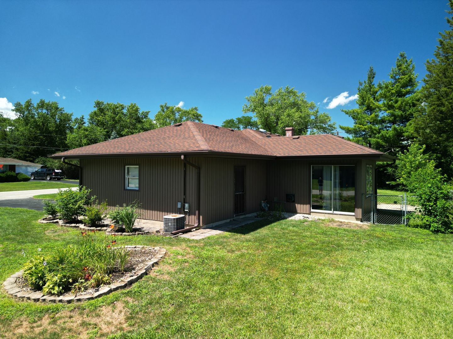 2 Northcrest Road Lake Zurich, IL 60047 - Photo 27 of 30 a front view of a house with a yard and garage