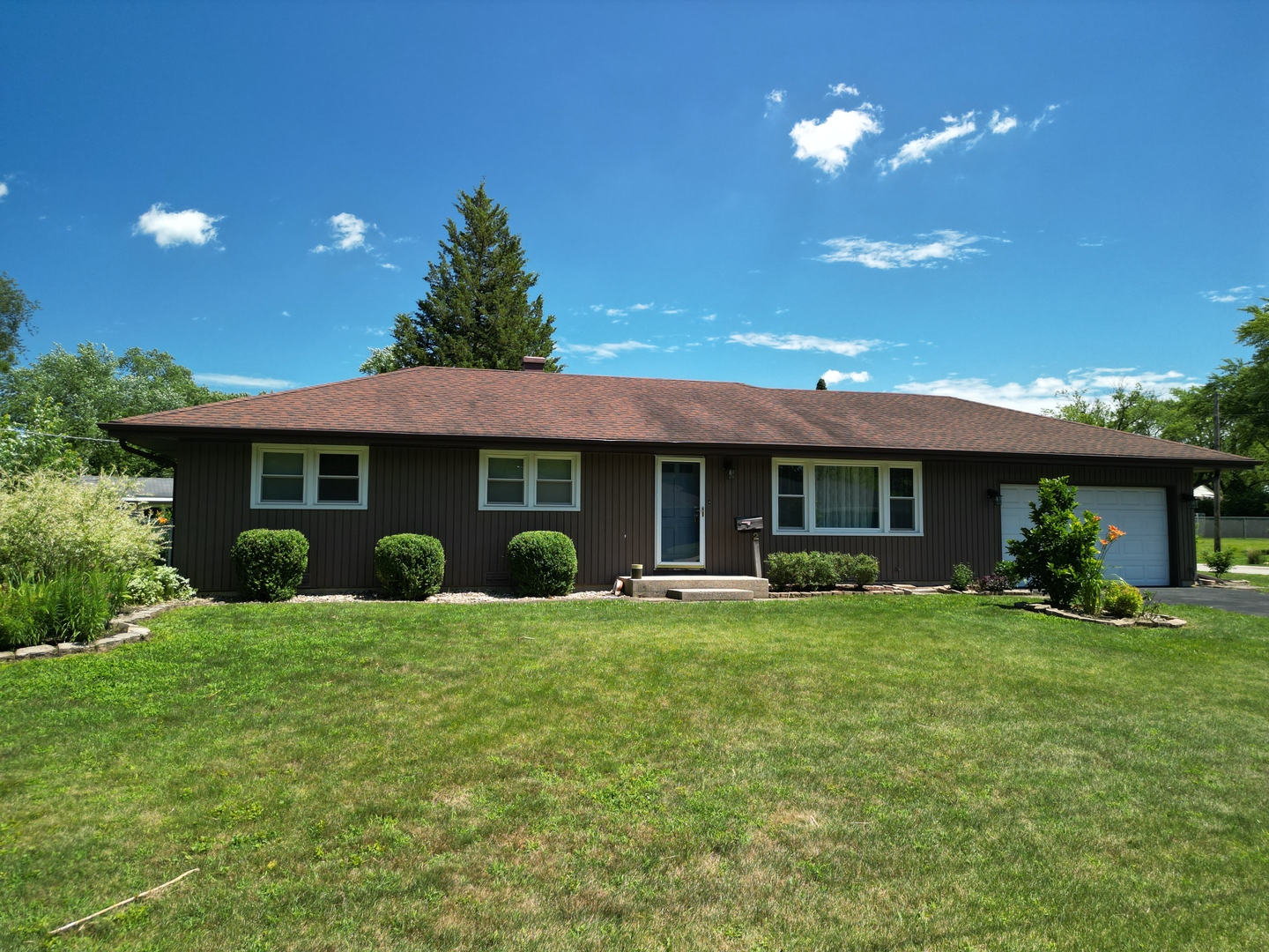 2 Northcrest Road Lake Zurich, IL 60047 - Photo 28 of 30 a front view of a house with a yard and porch