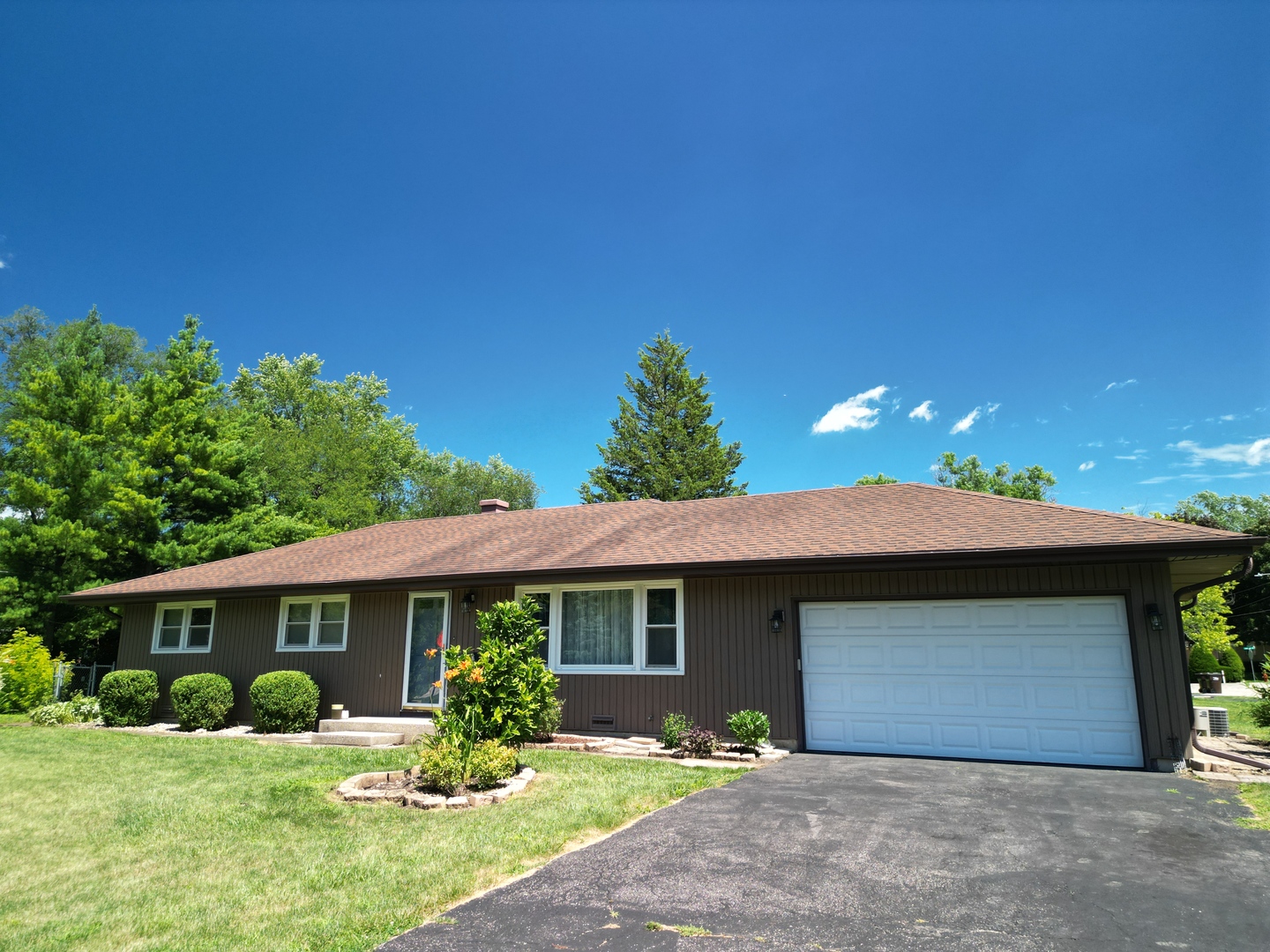 2 Northcrest Road Lake Zurich, IL 60047 - Photo 29 of 30 a front view of a house with garden