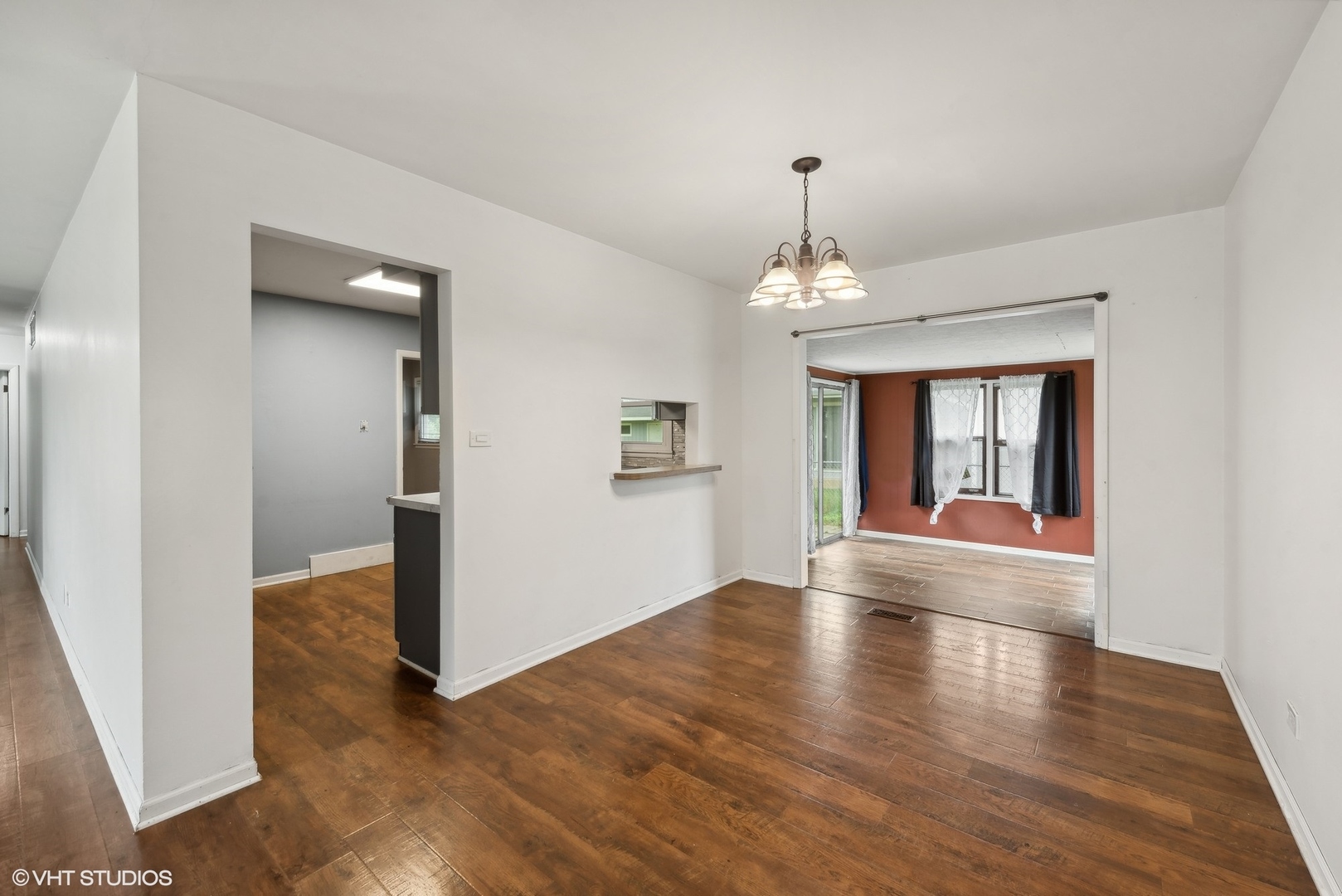 2 Northcrest Road Lake Zurich, IL 60047 - Photo 7 of 30 a view of livingroom and kitchen with hardwood floor