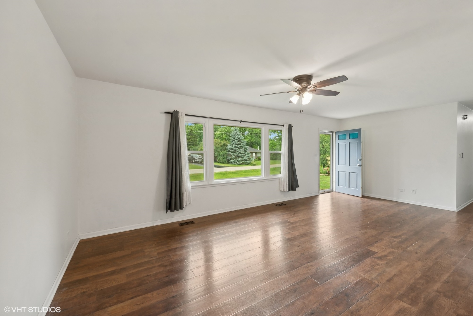 2 Northcrest Road Lake Zurich, IL 60047 - Photo 9 of 30 wooden floor in an empty room with a window