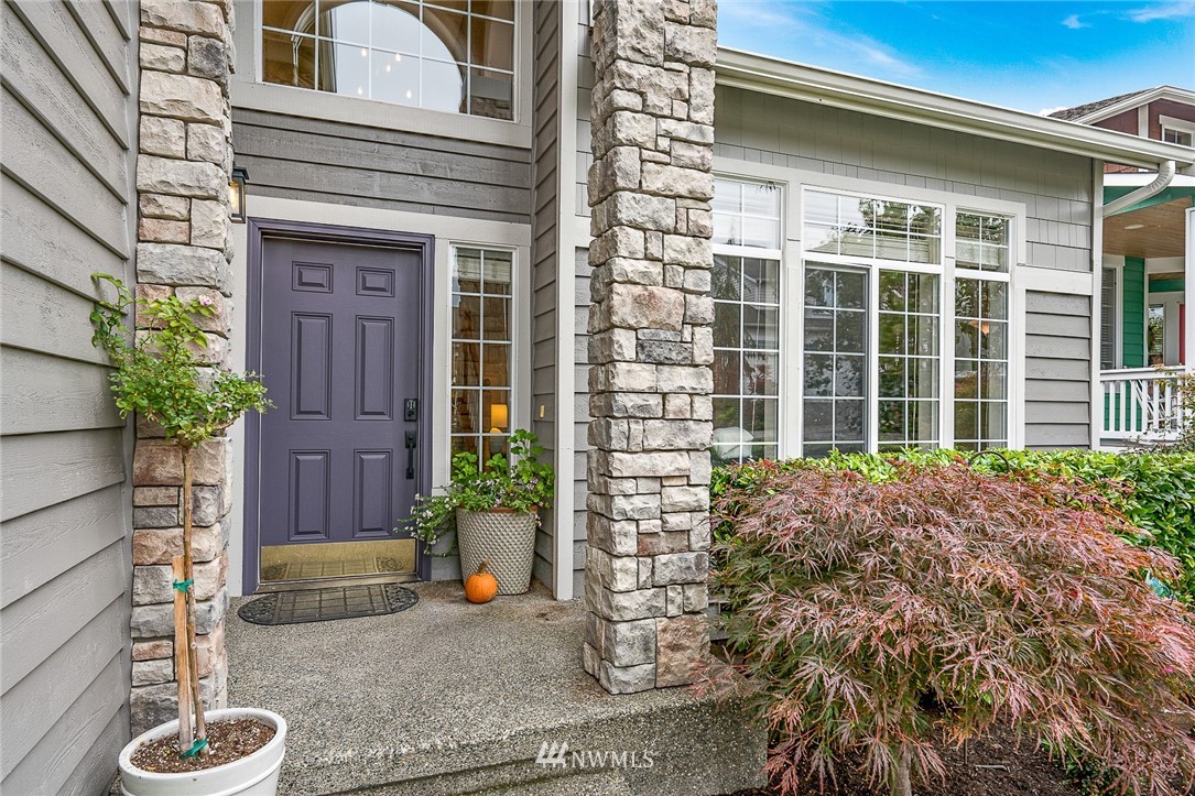 1117 184th Place Southeast Bothell, WA 98012 - Photo 3 of 40 a front view of a house with a yard