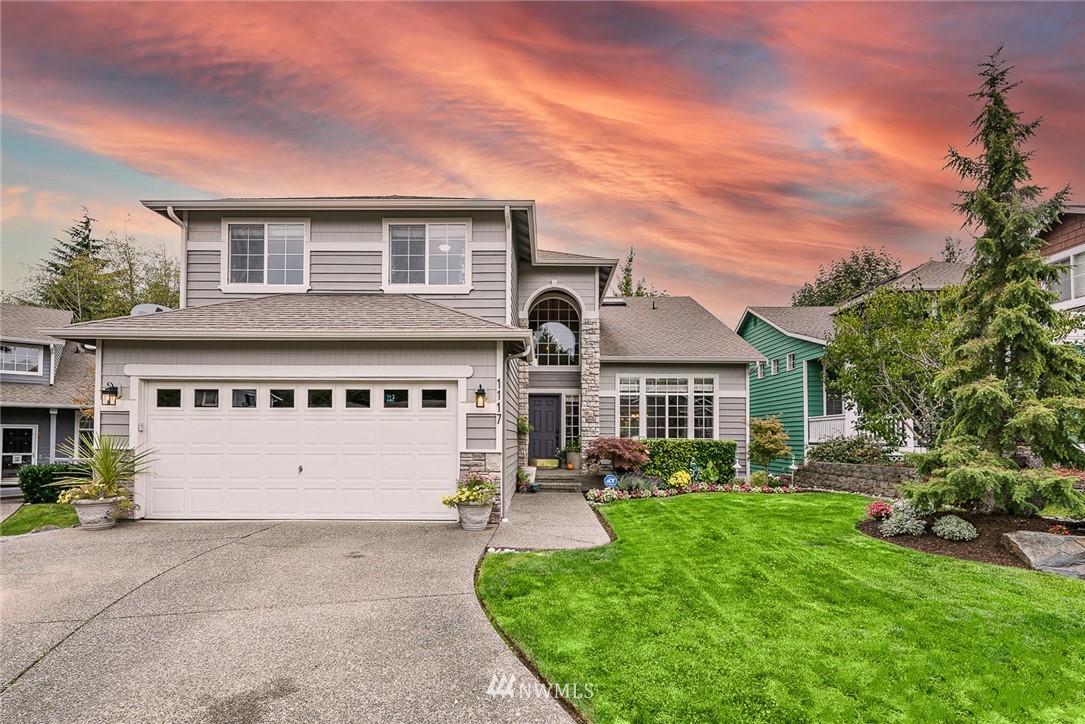 1117 184th Place Southeast Bothell, WA 98012 - Photo 40 of 40 a front view of a house with a yard and garage