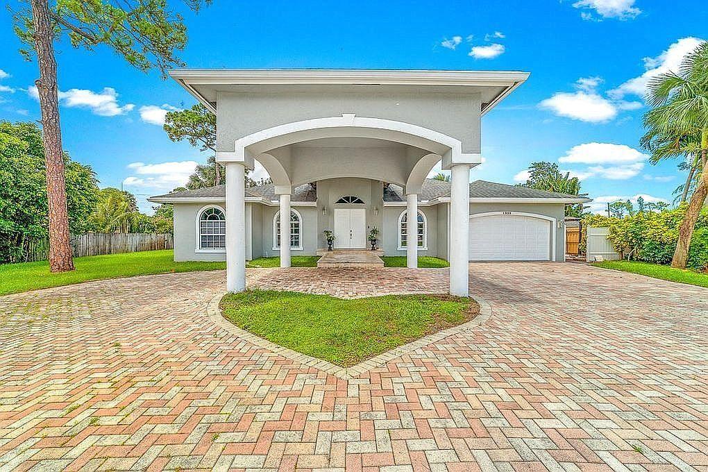 4929 Belvedere Road Haverhill, FL 33415 - Photo 1 of 31 3f02a6707e9e1a778a2354ae6124ae2b-uncropp