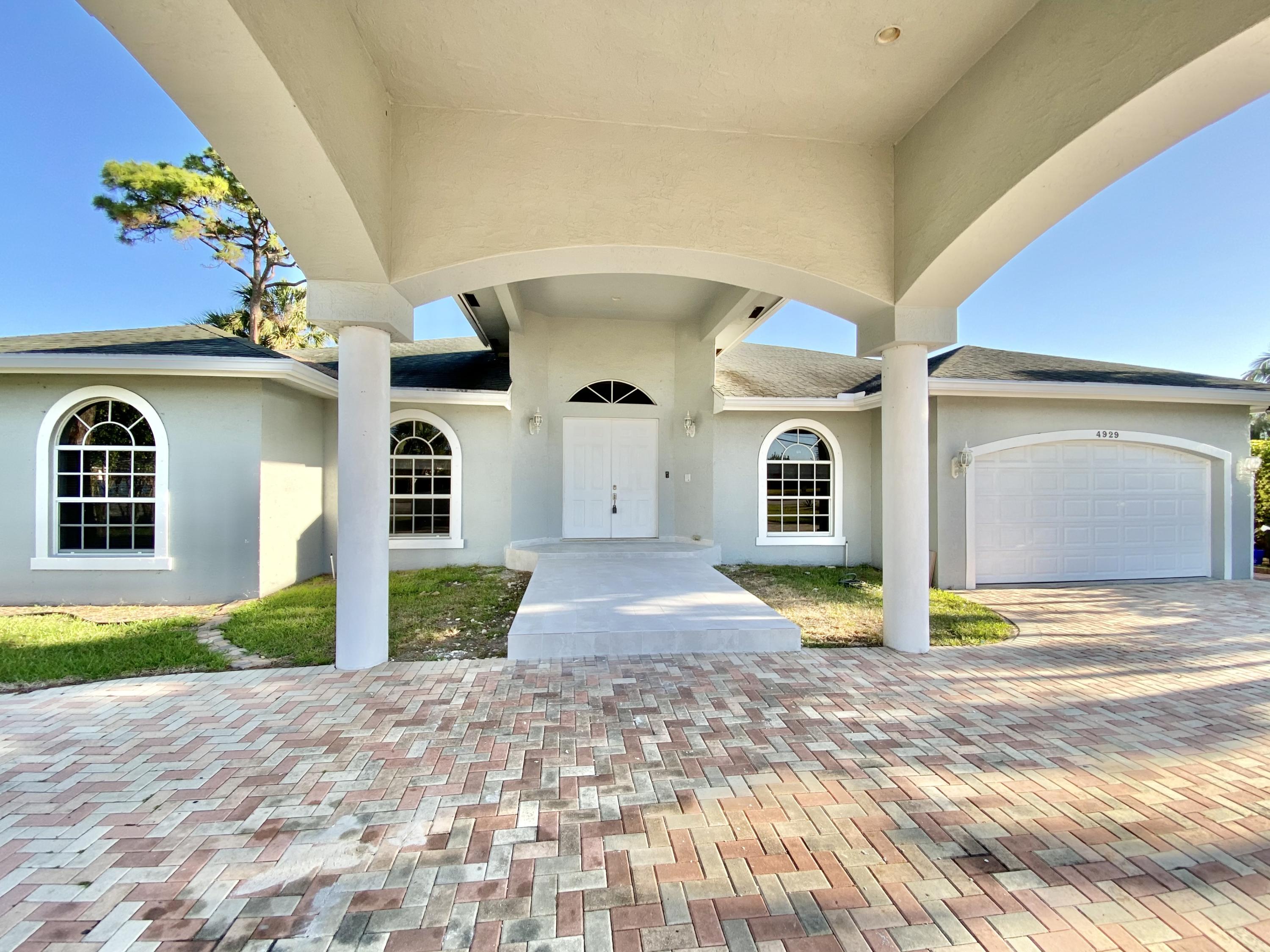 4929 Belvedere Road Haverhill, FL 33415 - Photo 2 of 31 IMG-4986