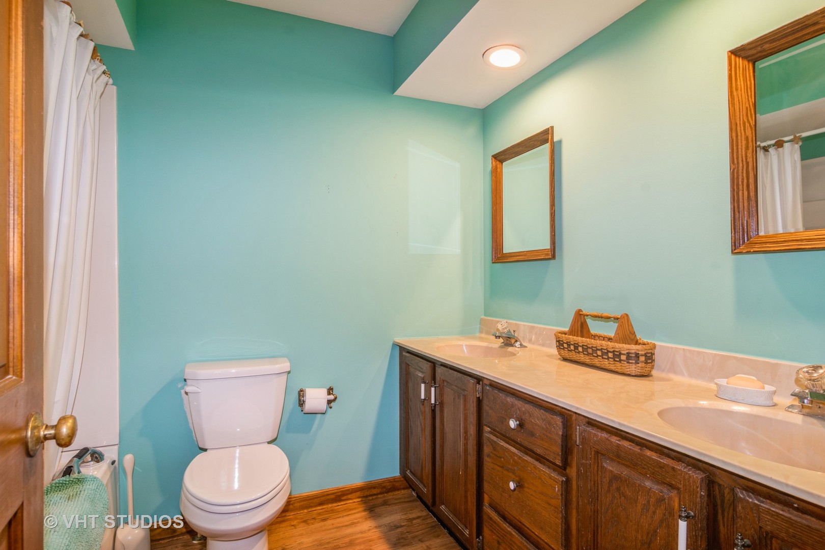 43-w757 Old Midlothian Road Elburn, IL 60119 - Photo 23 of 40 a bathroom with a toilet sink and mirror