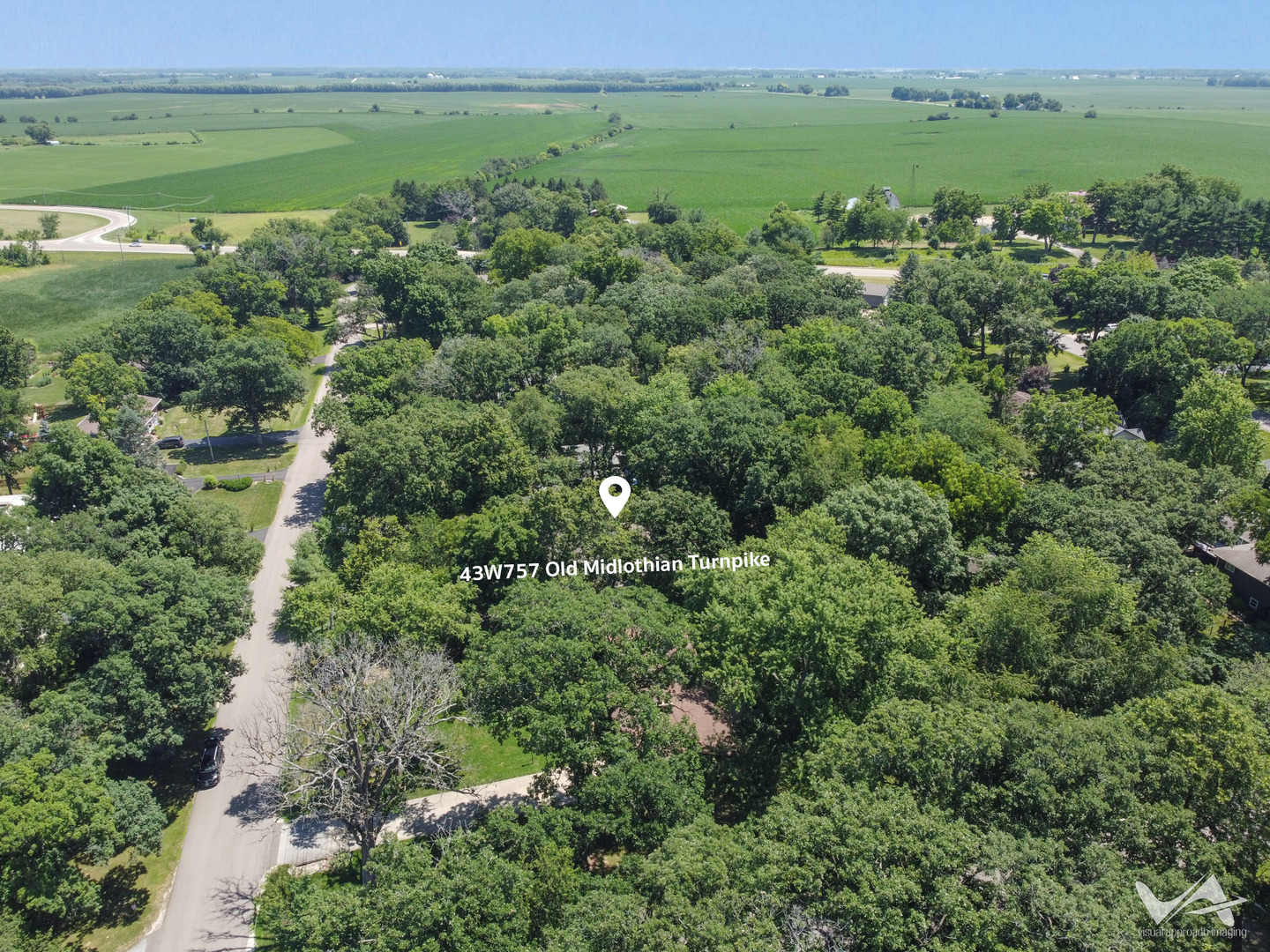 43-w757 Old Midlothian Road Elburn, IL 60119 - Photo 38 of 40 an aerial view of a houses with outdoor space and trees all around