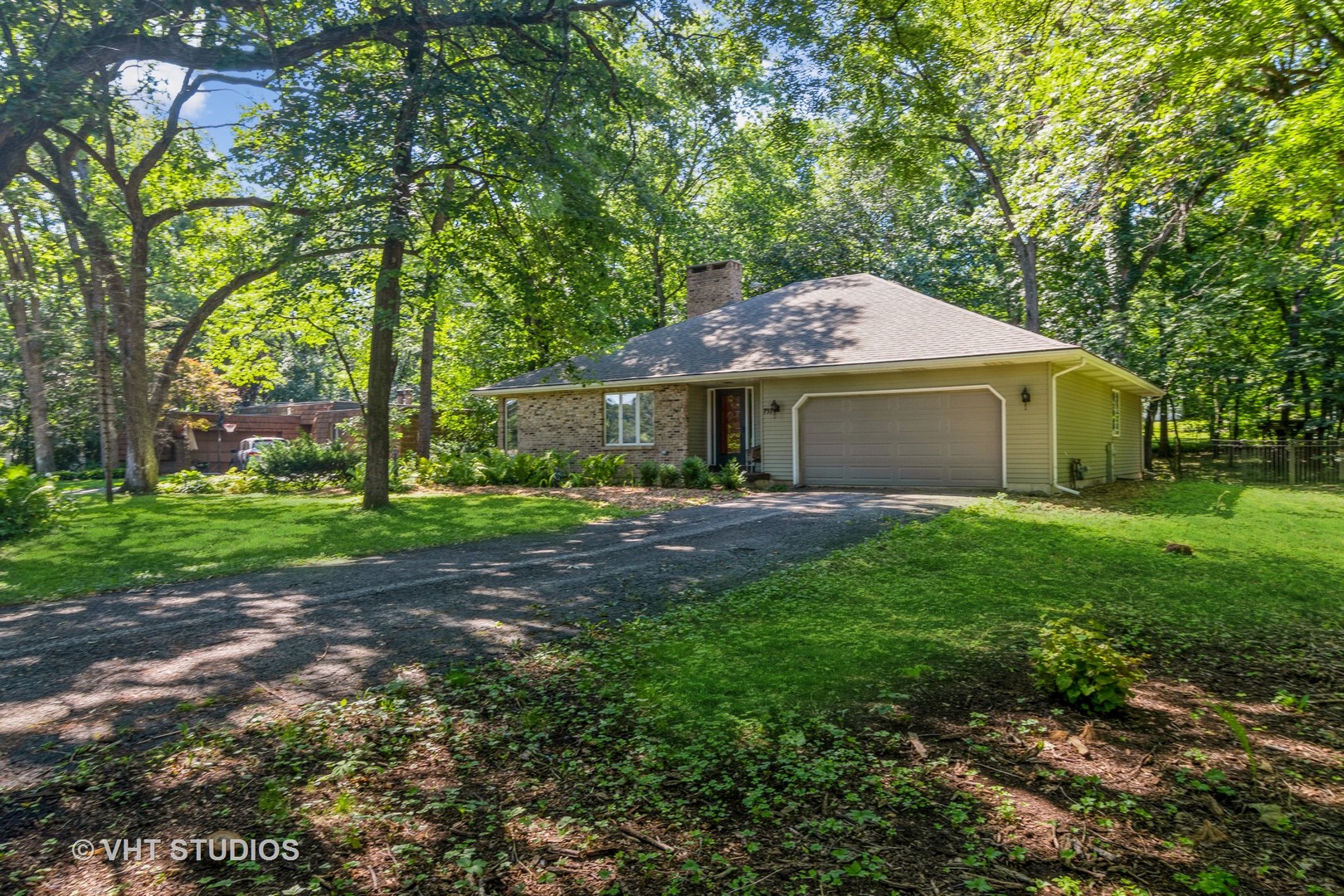 43-w757 Old Midlothian Road Elburn, IL 60119 - Photo 5 of 40 a front view of a house with a garden