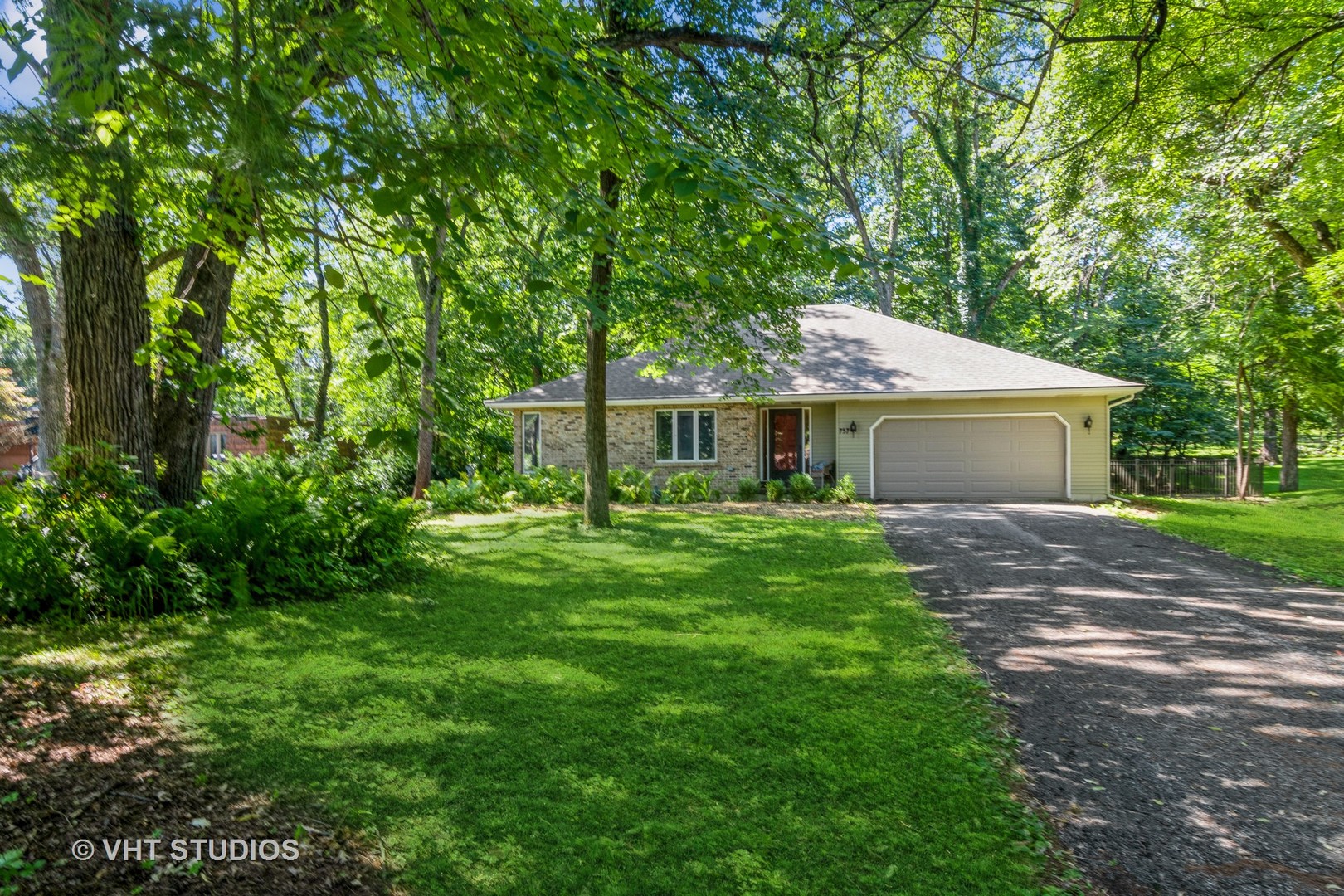 43-w757 Old Midlothian Road Elburn, IL 60119 - Photo 6 of 40 a front view of a house with a garden