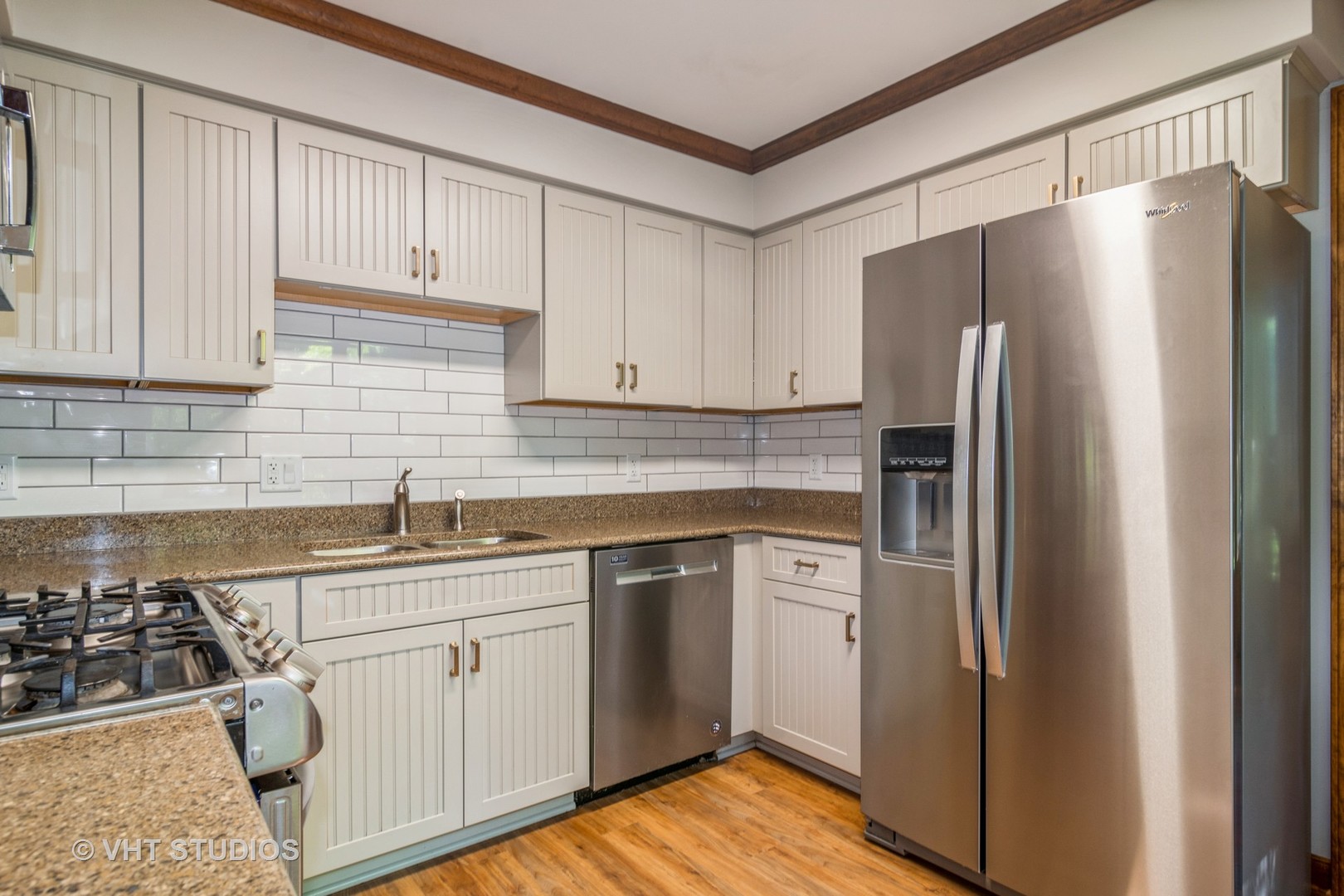 43-w757 Old Midlothian Road Elburn, IL 60119 - Photo 10 of 40 a kitchen with stainless steel appliances granite countertop a refrigerator sink and cabinets