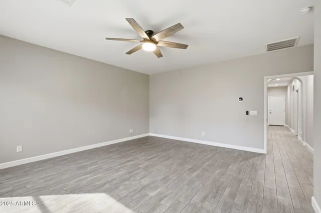 a view of an empty room with window