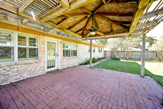 a view of a porch with a backyard