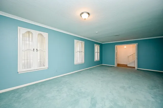 an empty room with windows