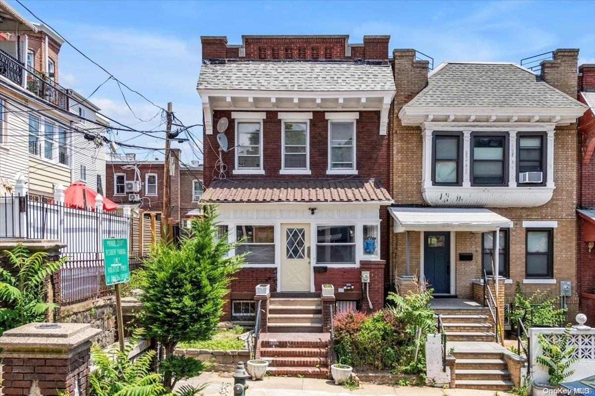 1 Van Siclen Avenue Brooklyn, NY 11207 - Photo 1 of 1 a front view of a residential apartment building with a yard