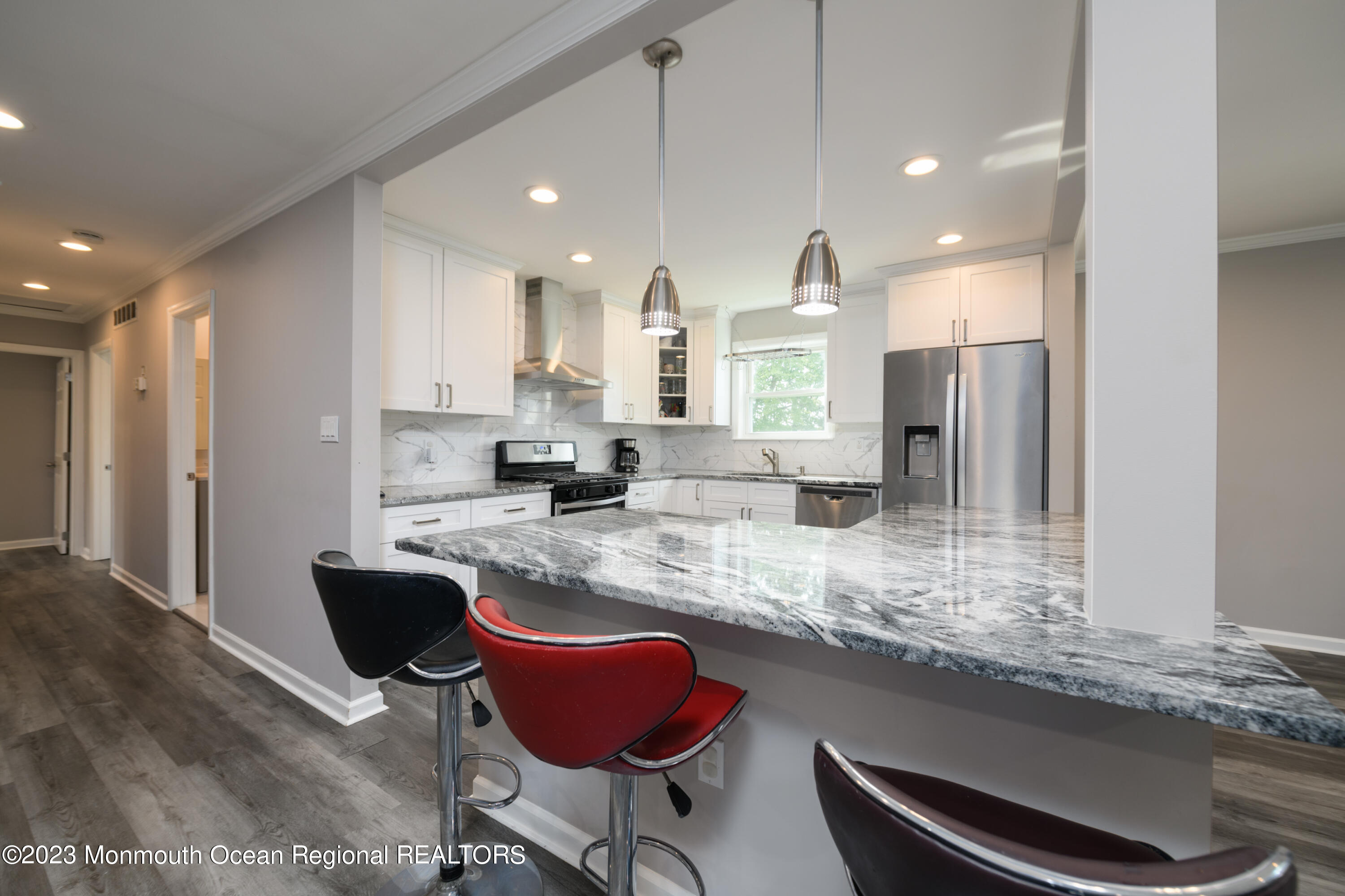 1 Nantucket Court Howell, NJ 07731 - Photo 15 of 38 a kitchen with stainless steel appliances granite countertop a sink refrigerator and cabinets