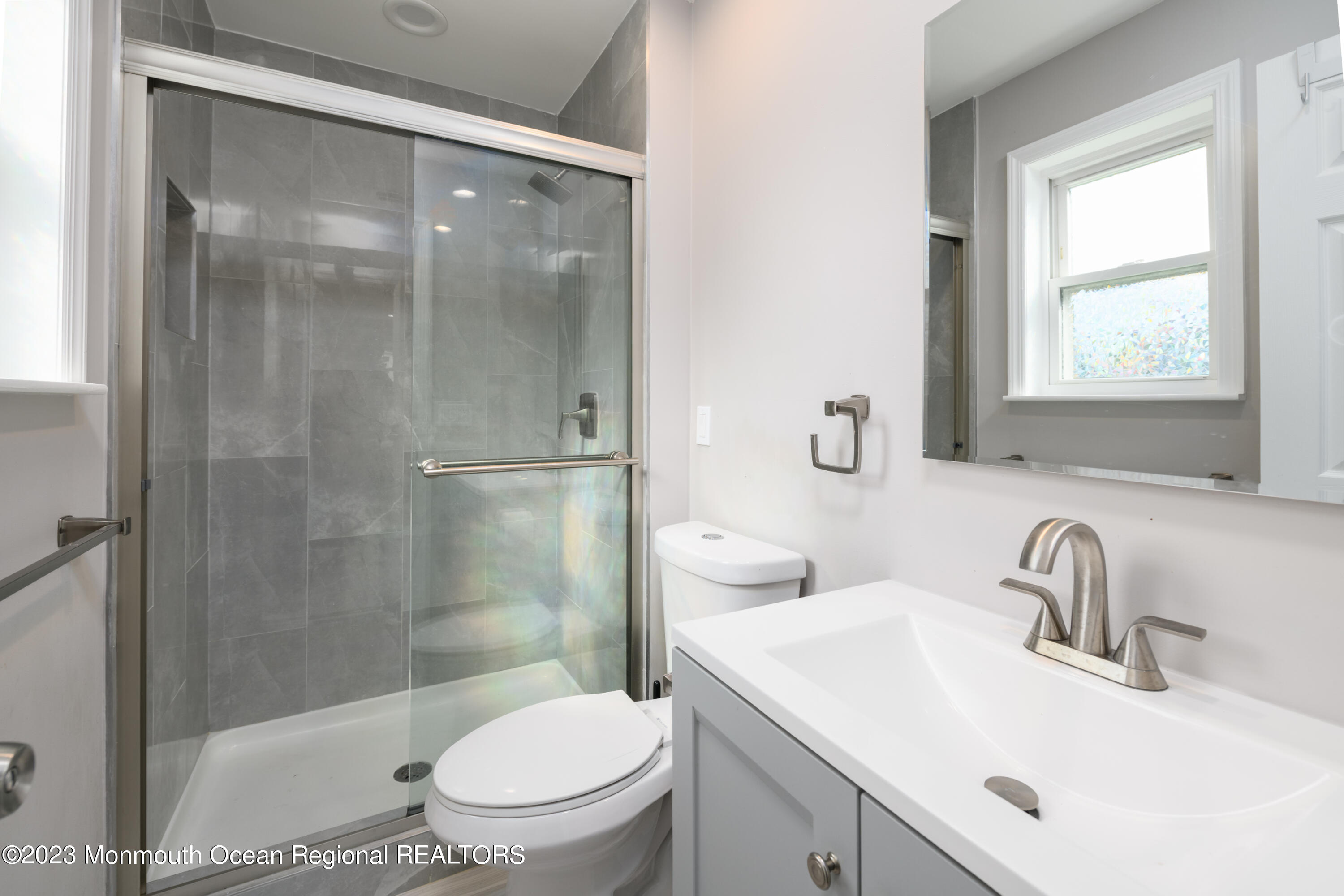 1 Nantucket Court Howell, NJ 07731 - Photo 20 of 38 a bathroom with a sink toilet and shower