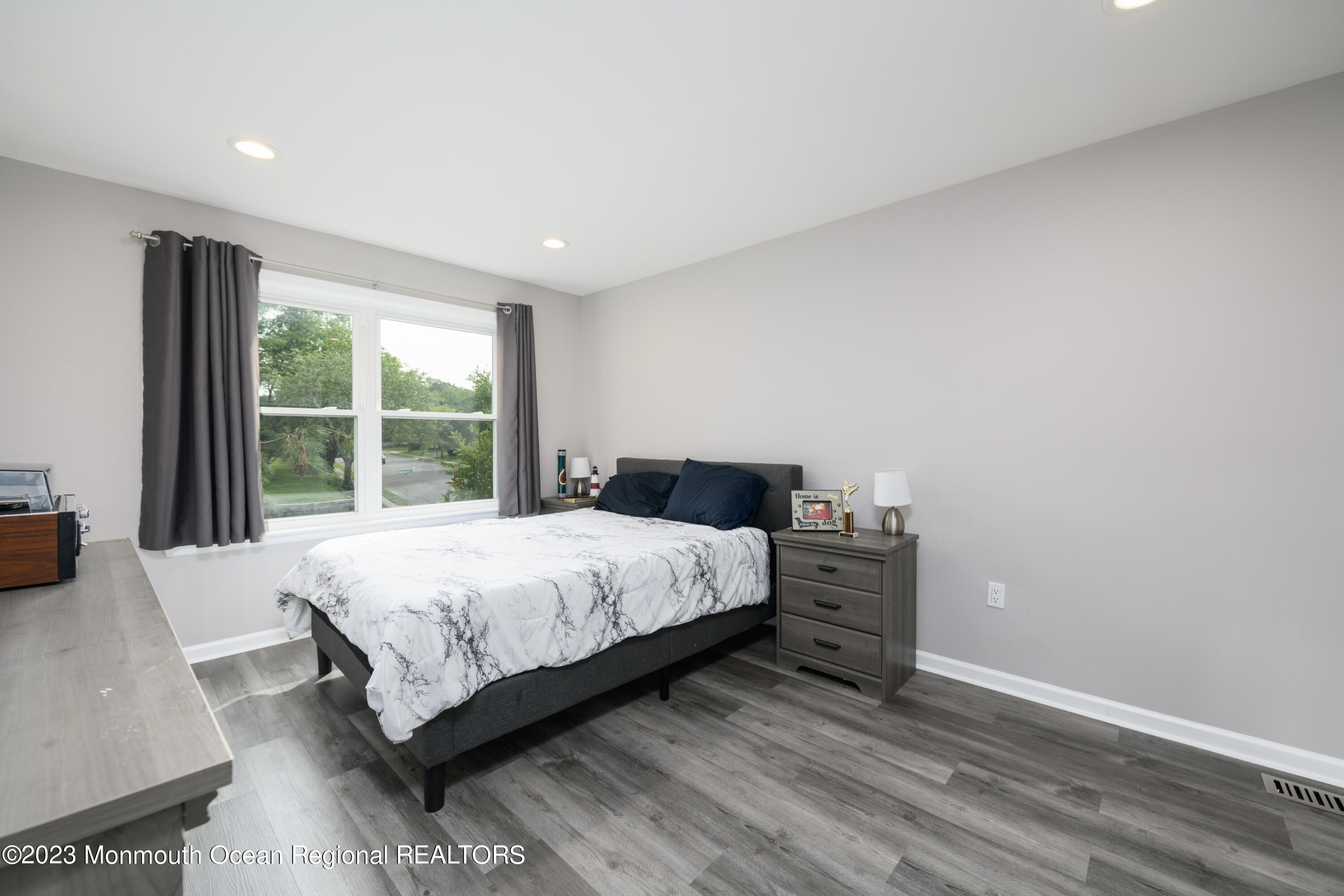 1 Nantucket Court Howell, NJ 07731 - Photo 22 of 38 a bed sitting in a spacious bedroom next to a window