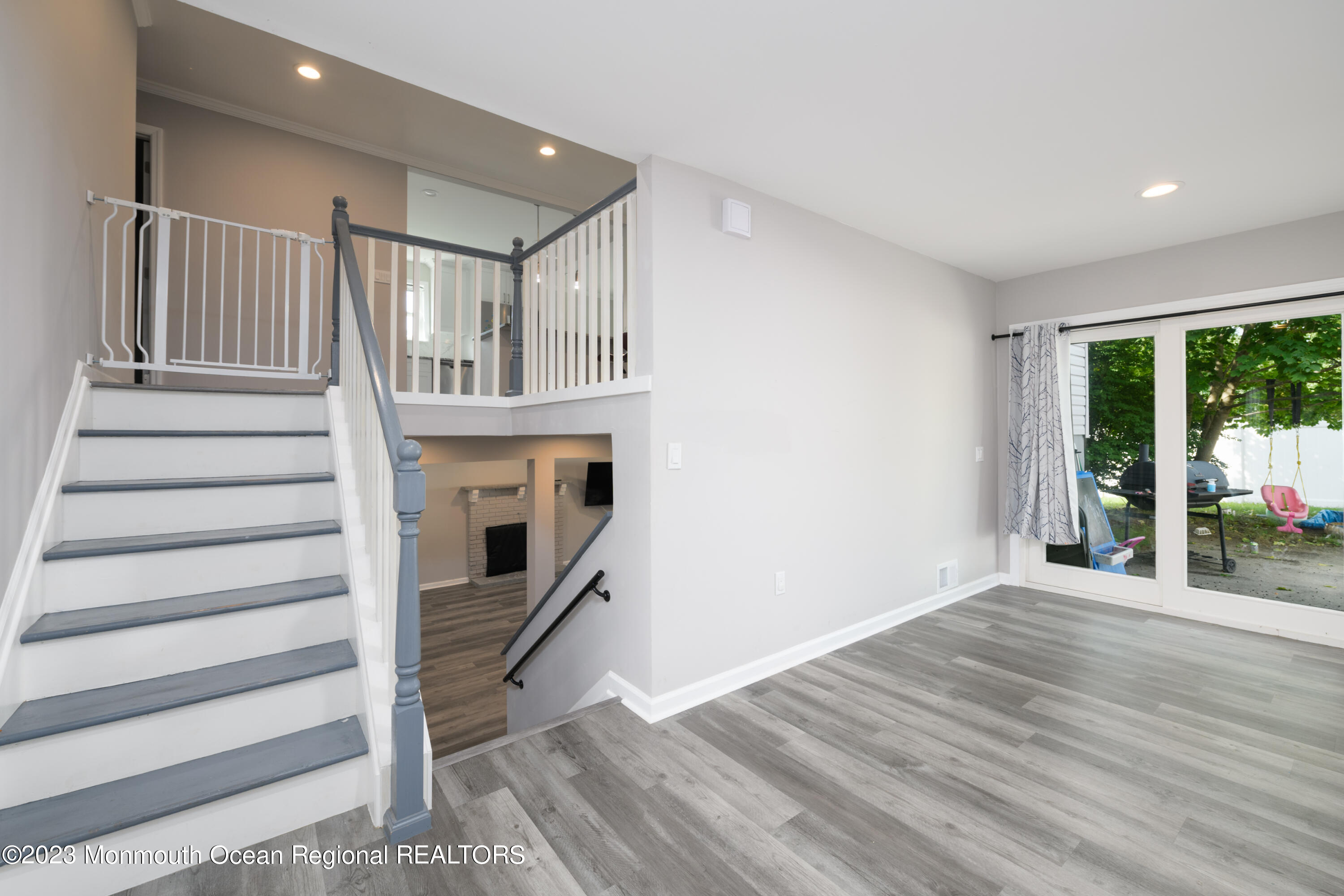 1 Nantucket Court Howell, NJ 07731 - Photo 5 of 38 a view of entryway with wooden floor and stairs