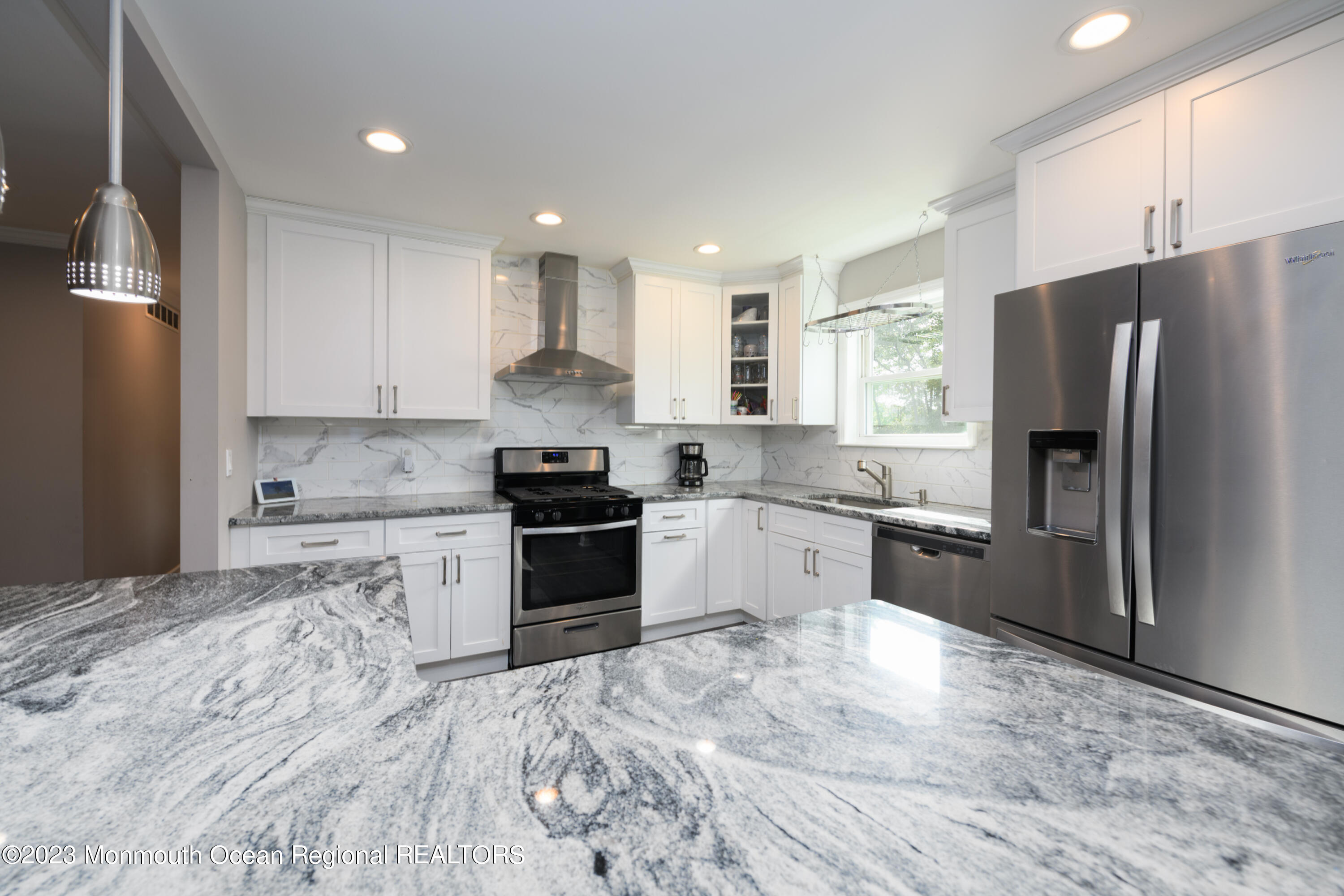 1 Nantucket Court Howell, NJ 07731 - Photo 8 of 38 a kitchen with granite countertop a refrigerator stove top oven and sink