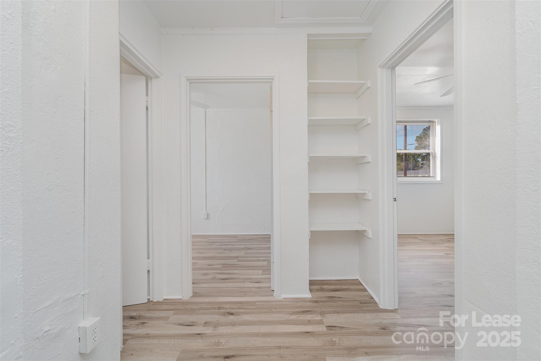 200 York Street, Unit G2 Chester, SC 29706 - Photo 9 of 16 a view of entryway and hall with wooden floor