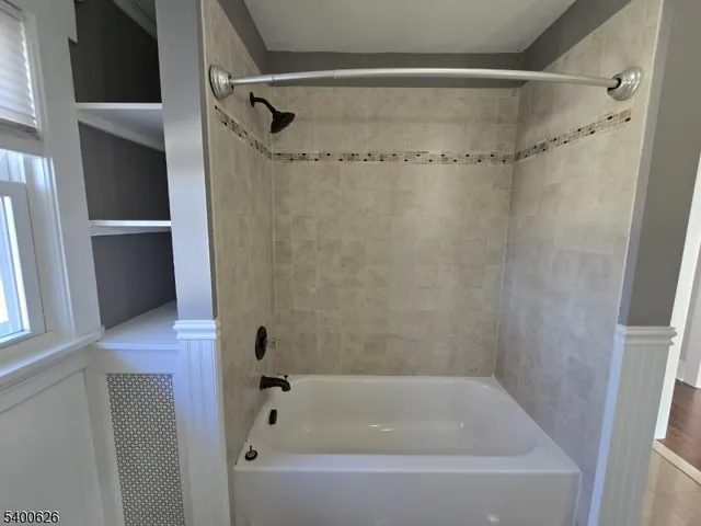 a bathroom with a bathtub