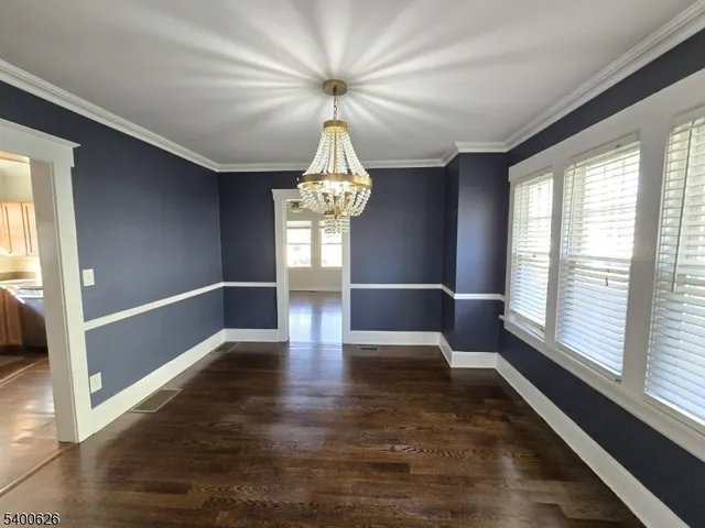 a view of an entryway with a chandelier