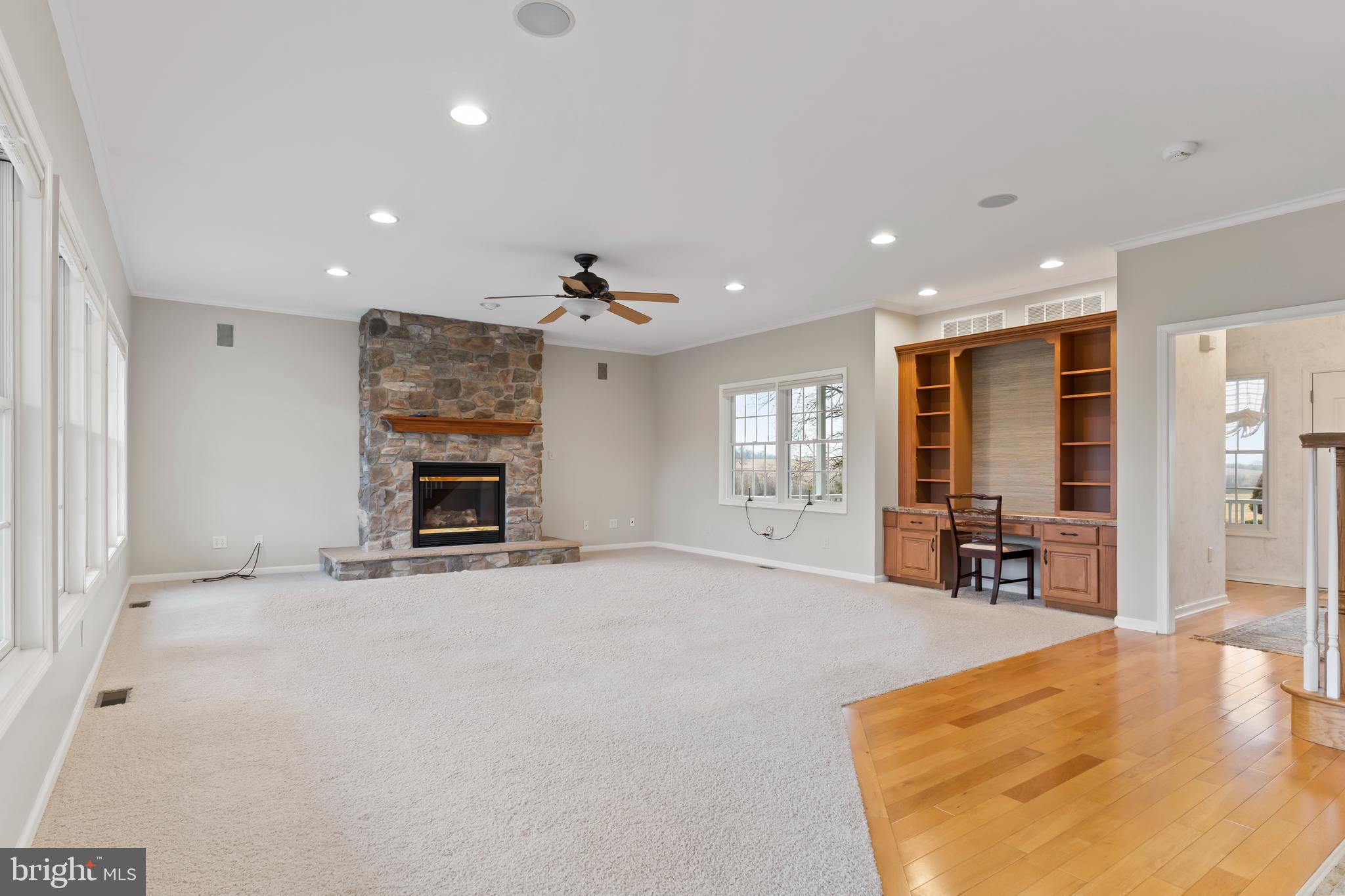 2562 Echo Springs Road, Unit 35 Chambersburg, PA 17202 - Photo 17 of 50 a view of an empty room with window and a fireplace