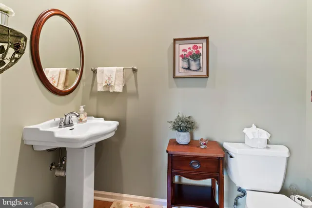 a living room with furniture fireplace and a flat screen tv