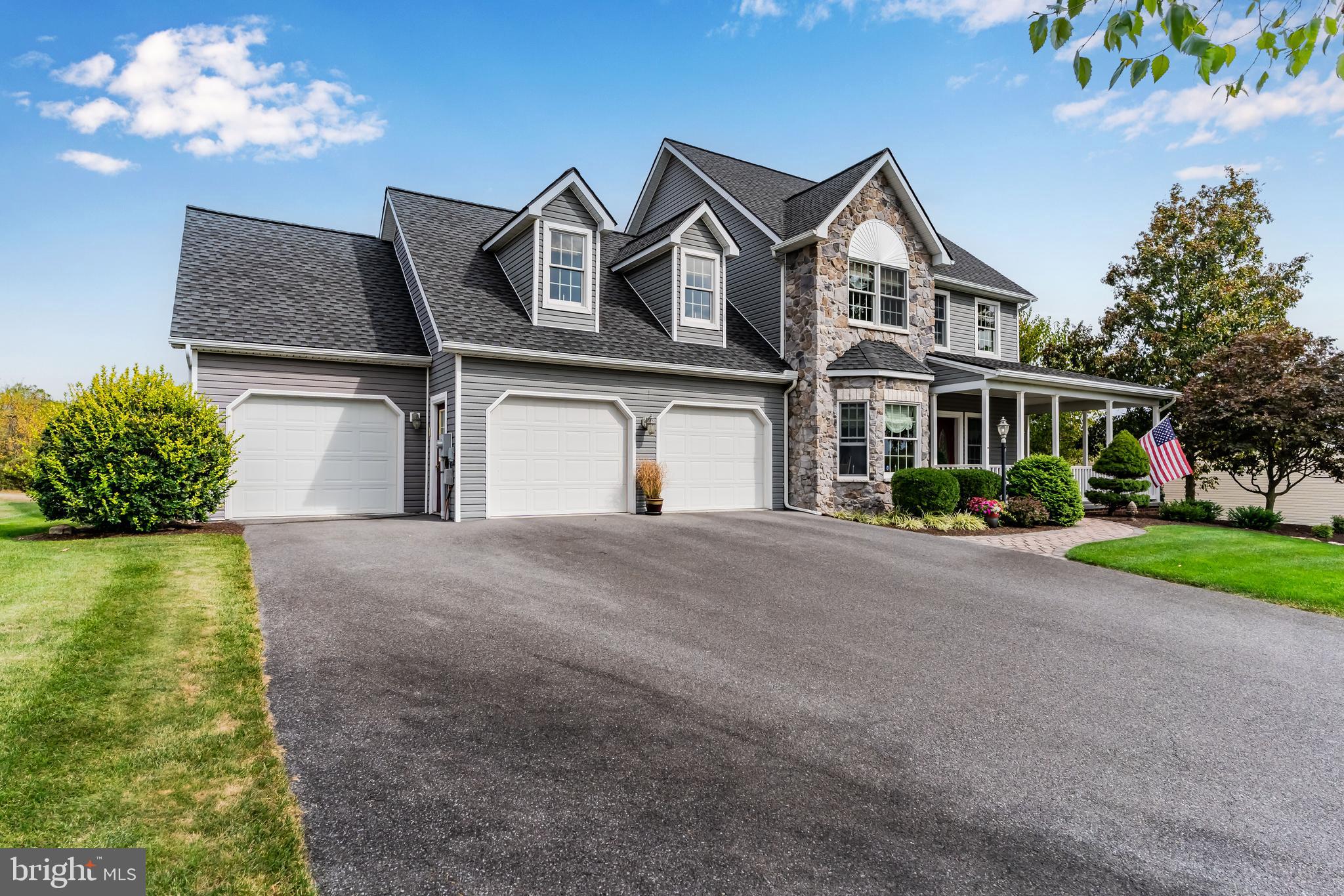 2562 Echo Springs Road, Unit 35 Chambersburg, PA 17202 - Photo 2 of 50 a front view of a house with garden