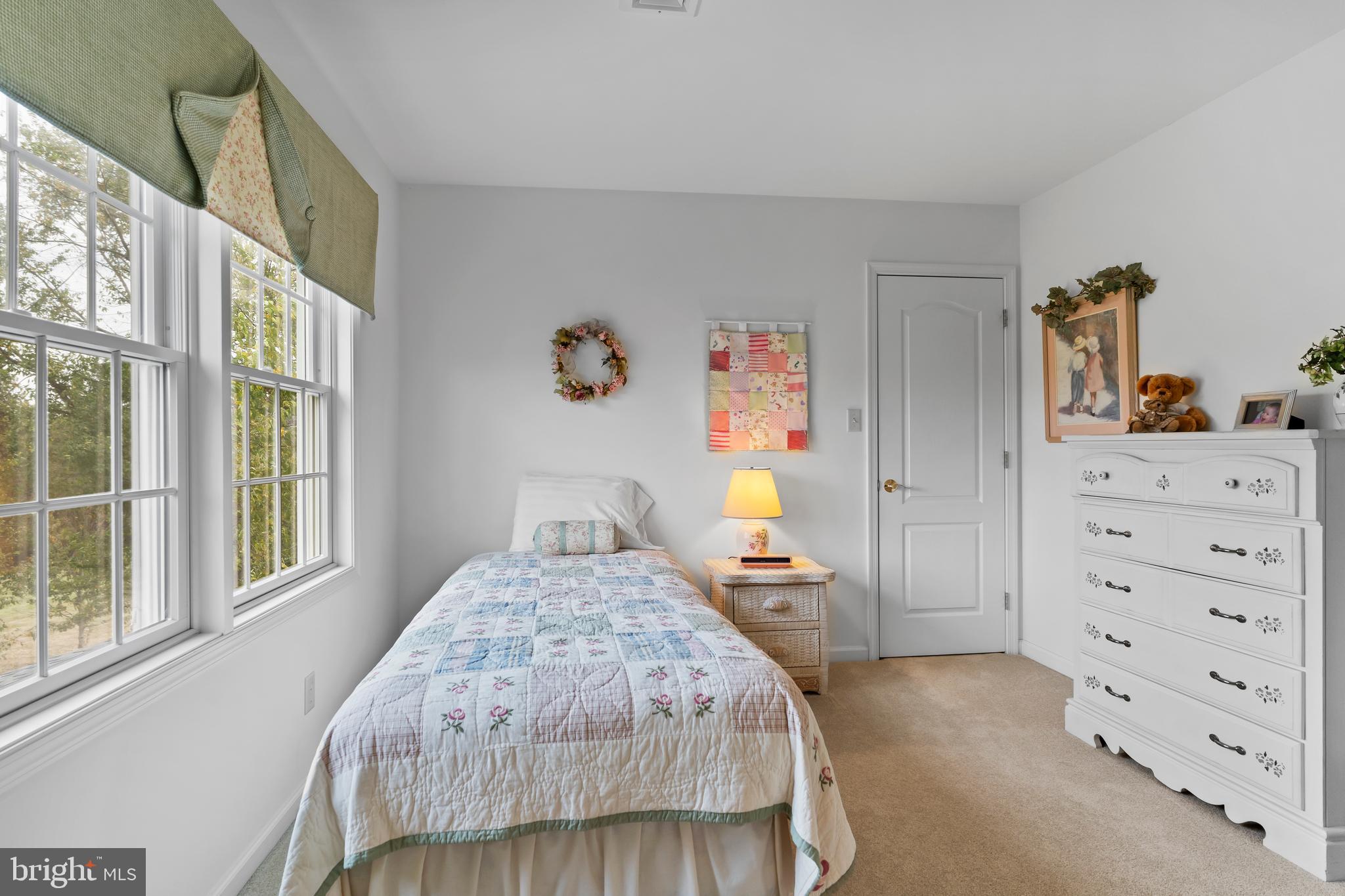 2562 Echo Springs Road, Unit 35 Chambersburg, PA 17202 - Photo 37 of 50 a bedroom with a bed and a window