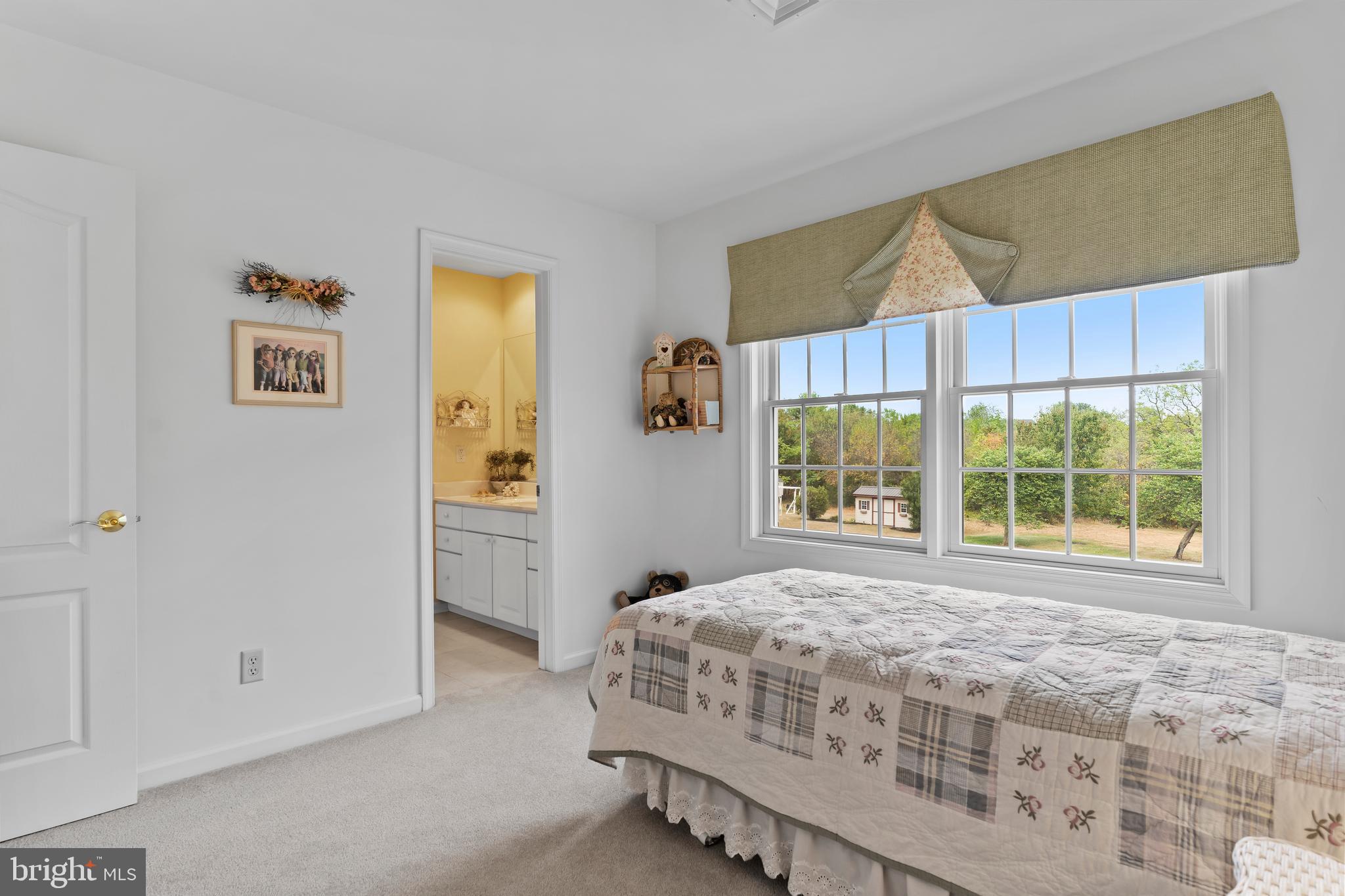 2562 Echo Springs Road, Unit 35 Chambersburg, PA 17202 - Photo 38 of 50 a bedroom with a bed and a window