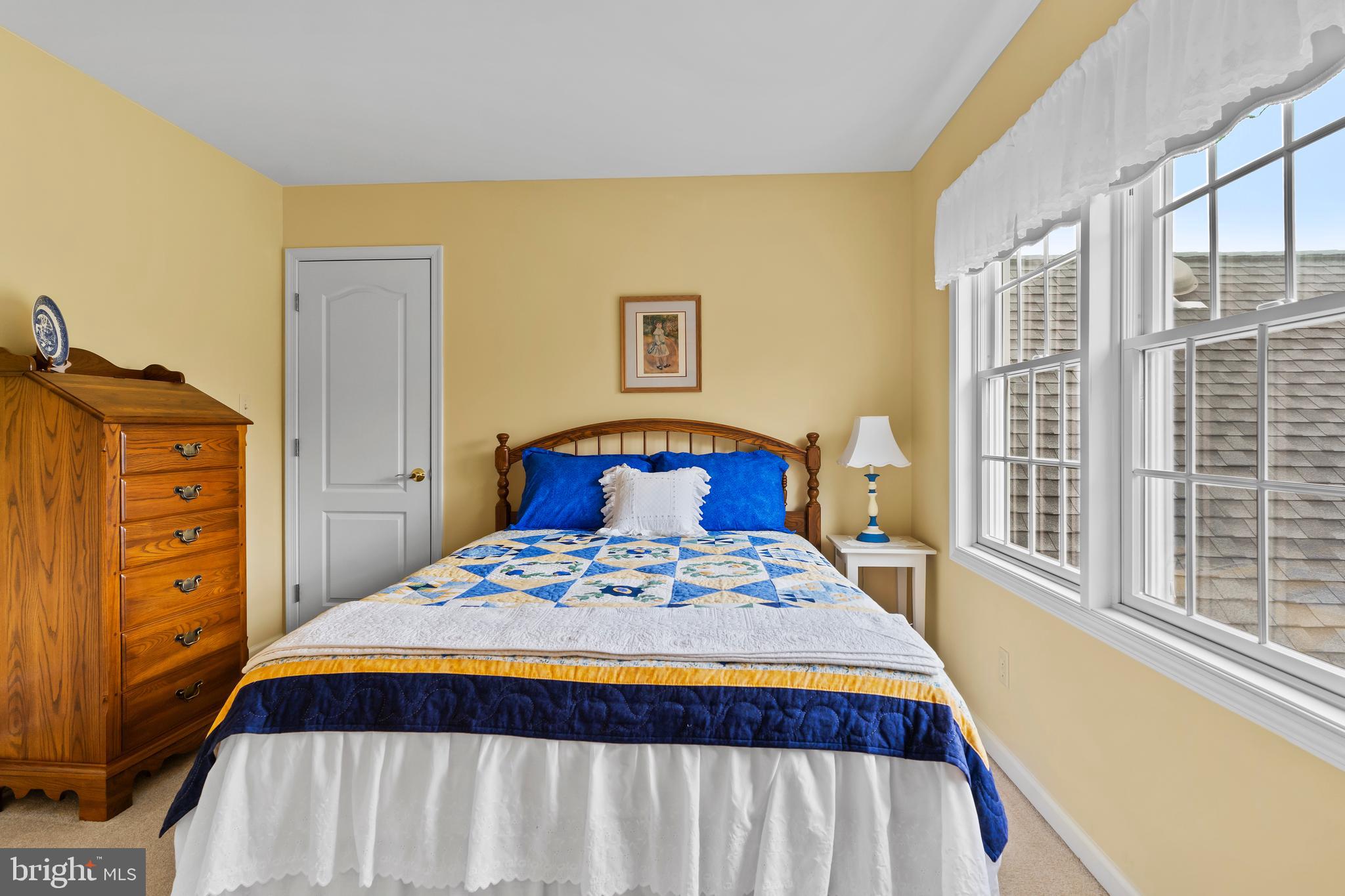 2562 Echo Springs Road, Unit 35 Chambersburg, PA 17202 - Photo 41 of 50 a bedroom with a bed and wooden floor