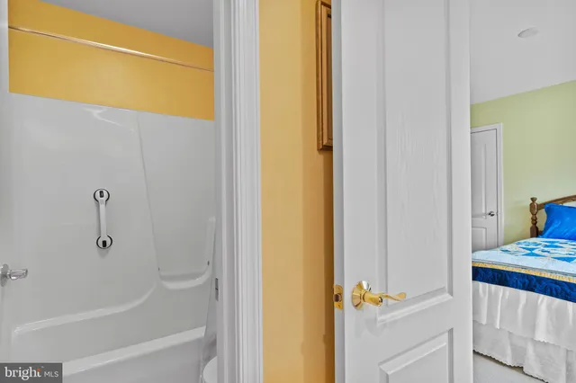 a bathroom with a sink vanity and a mirror