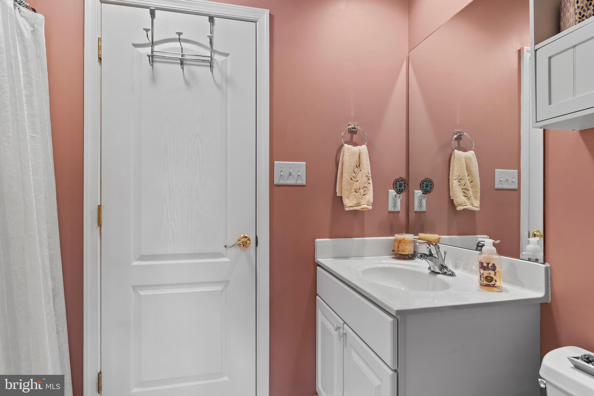 2562 Echo Springs Road, Unit 35 Chambersburg, PA 17202 - Photo 43 of 50 a bathroom with a sink vanity and a mirror