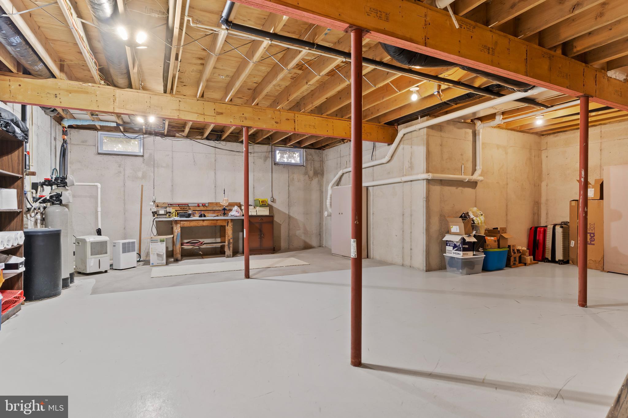2562 Echo Springs Road, Unit 35 Chambersburg, PA 17202 - Photo 47 of 50 a view of a storage room with furniture and a ceiling fan