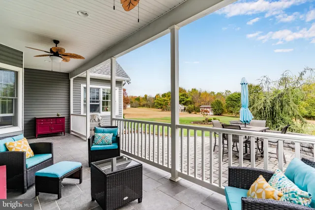 a view of a porch with furniture
