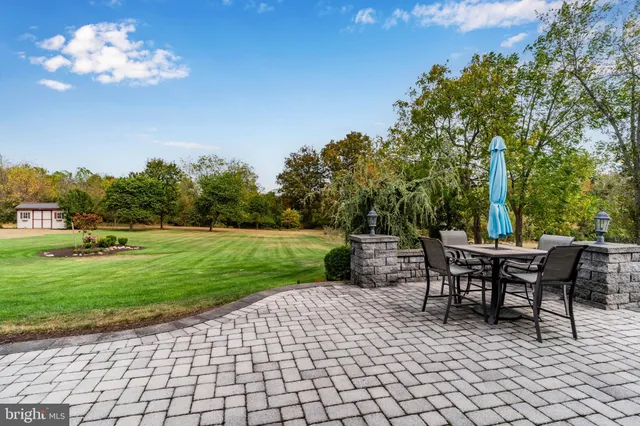 a view of a yard with furniture