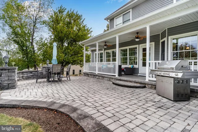 a view of a dinning table and chair in the patio