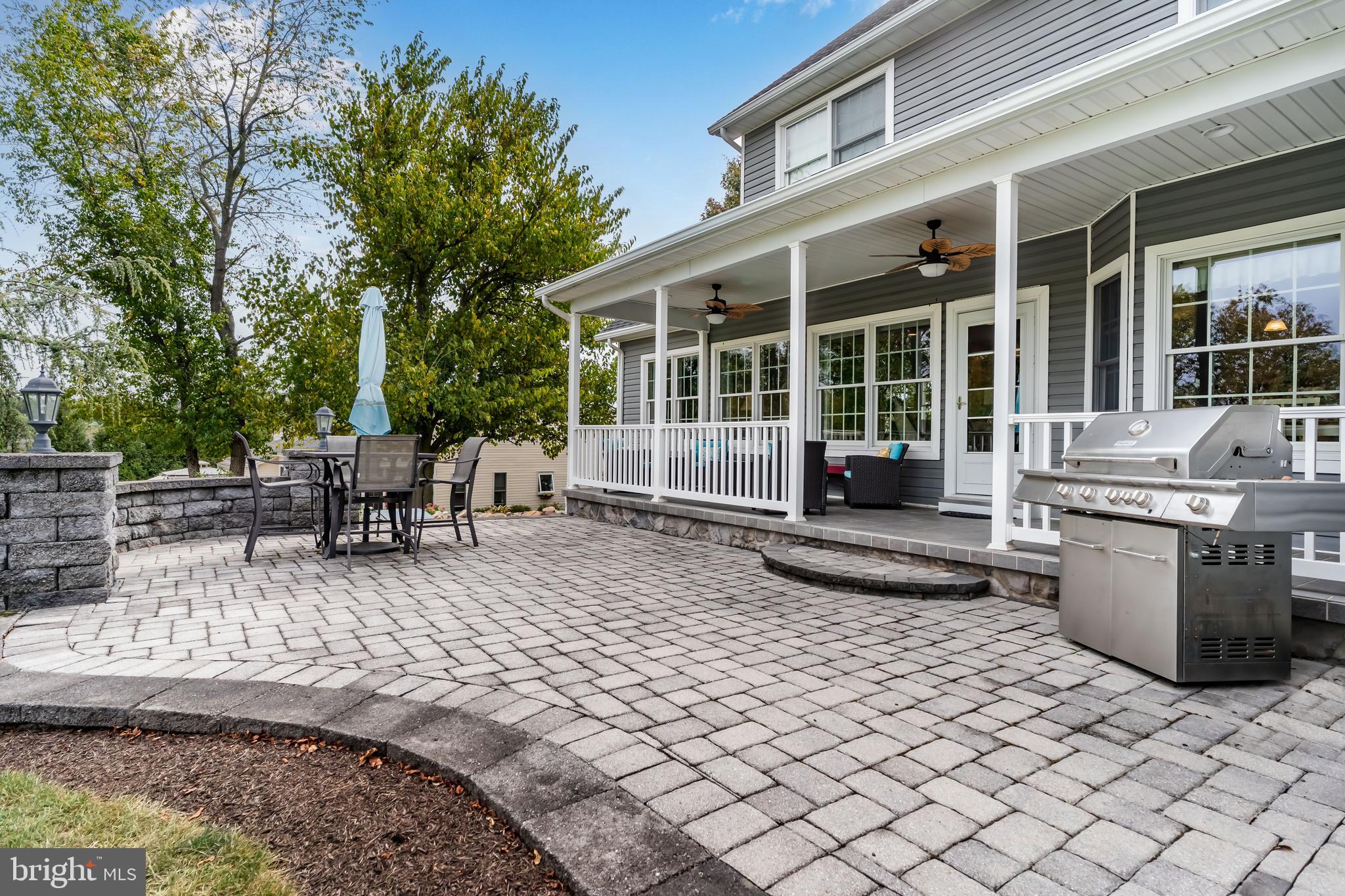 2562 Echo Springs Road, Unit 35 Chambersburg, PA 17202 - Photo 8 of 50 a view of a dinning table and chair in the patio