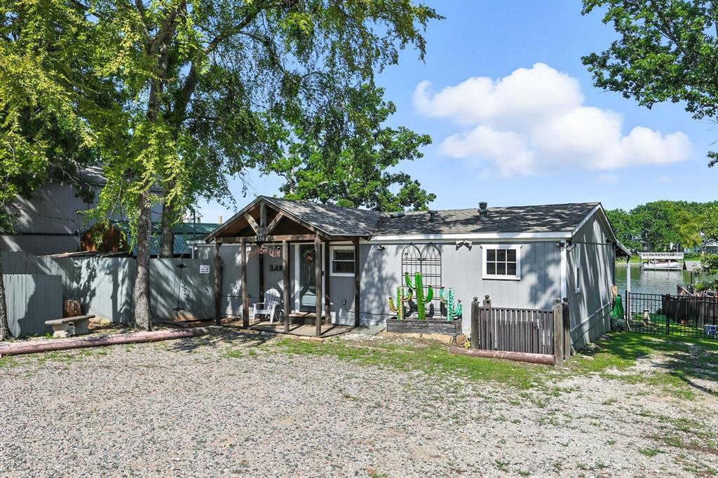 150 Red Bluff Loop Mabank, TX 75156 - Photo 13 of 26 a view of a house with backyard