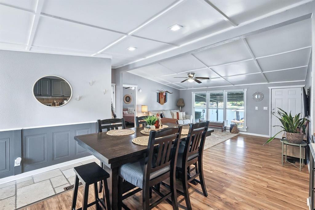 150 Red Bluff Loop Mabank, TX 75156 - Photo 17 of 26 a view of a dining room with furniture and wooden floor