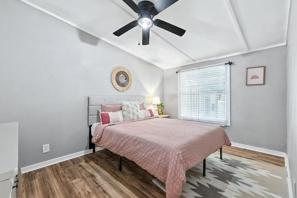 150 Red Bluff Loop Mabank, TX 75156 - Photo 24 of 26 a bedroom with a bed and a window
