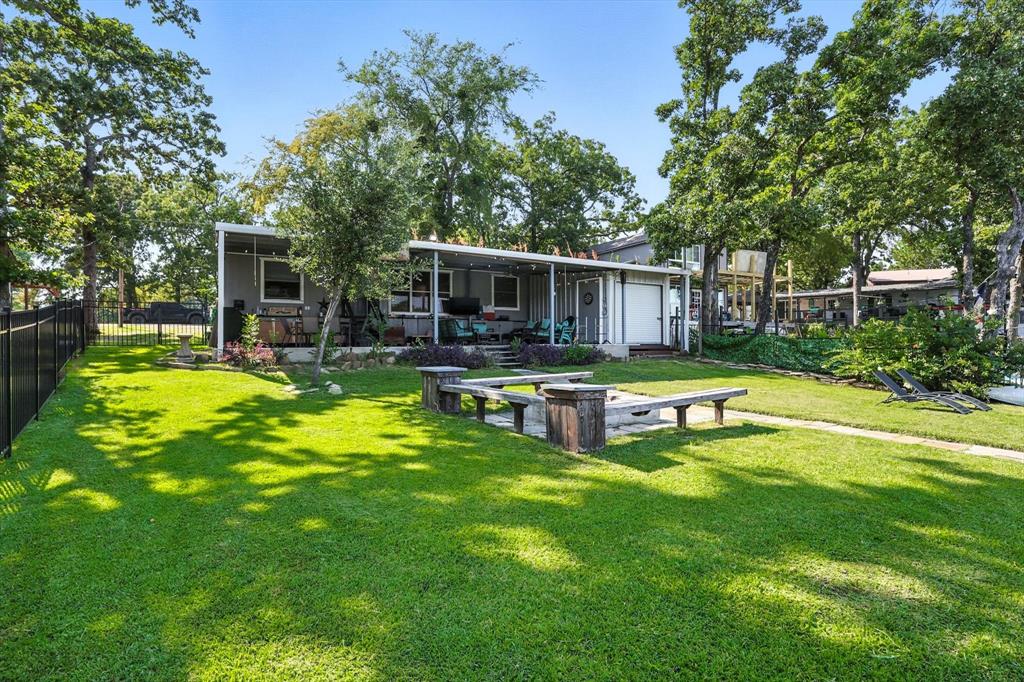 150 Red Bluff Loop Mabank, TX 75156 - Photo 5 of 26 a swimming pool with outdoor seating and yard